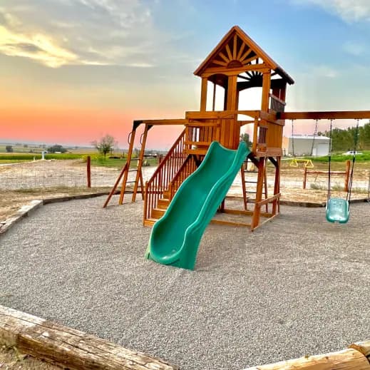Children's swing set in the cabin yard